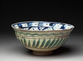 Bowl with central triangle and spiralling panels