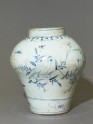 Jar with a bird on a prunus spray