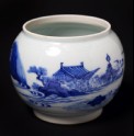 Blue-and-white bowl with figure lying beneath a tree
