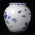 Blue-and-white jar with birds, rocks, and flowering branches
