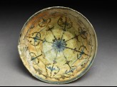 Bowl with rosette and radiating bands