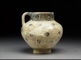 Jug with circles and inscription