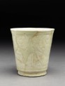 Beaker with incised frieze