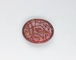 Oval bezel seal with nasta’liq inscription and floral decoration