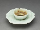 White ware cup stand with petals
