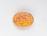 Oval bezel seal with nasta‘liq inscription and floral decoration (EA1980.40)