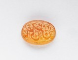 Oval bezel seal with nasta‘liq inscription and floral decoration