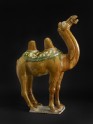 Earthenware figure of a camel with a saddle cloth