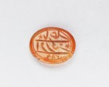 Oval bezel seal with inscription in cursive script and six-pointed stars