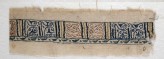 Textile fragment with band of pseudo-inscription, leaf-shaped finials, and tendrils (EA1984.110)