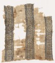 Textile fragment with bands of crosses, diamond-shapes, and arrows