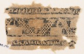 Textile fragment with stepped rectangles and remains of inscription