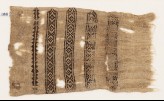 Textile fragment with diamond-shapes and triangles