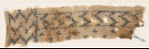 Textile fragment with chevrons and birds, probably from a tunic