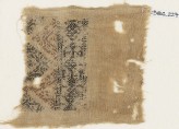 Textile fragment with linked diamond-shapes and triangles (EA1984.227)