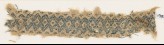 Textile fragment with band of linked diamond-shapes (EA1984.232)
