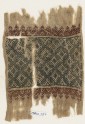 Textile fragment with linked diamond-shapes, triangles, and palmettes