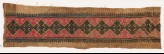 Textile fragment with diamond-shapes, triangles, and floral shapes