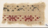 Textile fragment with bands of interlaced crosses and diamond-shapes (EA1984.244)