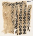 Textile fragment with bands of S-shapes, hooks, and leaves (EA1984.250)