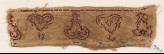 Textile fragment with leaves and palmettes, possibly from trousers or a collar (EA1984.263.a)