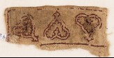 Textile fragment with leaves and palmettes, possibly from trousers or a collar