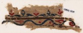 Textile fragment with vine and leaves