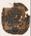 Textile fragment with rosette and scrolls (EA1984.286)