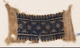 Textile fragment with band of diamond-shapes and linked crosses