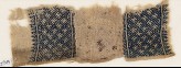 Textile fragment with grid and stylized letter (EA1984.298)