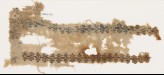 Textile fragment with linked hooks and stylized leaves