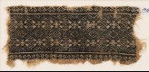 Textile fragment with linked diamond-shapes, rosettes, and possibly palmettes