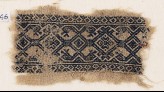 Textile fragment with interlace, and heads of serpents or birds (EA1984.346)