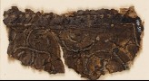 Textile fragment with tendrils and palmette