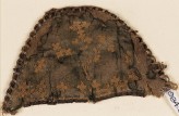 Textile fragment from a slipper front with linked crosses