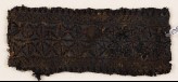 Textile fragment with band of stars or flowers (EA1984.365)