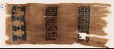 Textile fragment with swastikas and stars