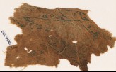 Textile fragment with vines and leaves, probably from a garment or trousers