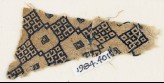 Textile fragment with linked diamond-shapes (EA1984.401)