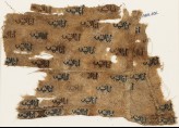 Textile fragment with repeated inscription