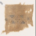Textile fragment with band framed by triangles (EA1984.432)