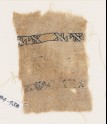 Textile fragment with two bands with cartouches and diagonal lines (EA1984.436)