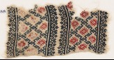 Textile fragment with linked diamond-shapes