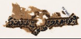 Textile fragment with inscription