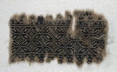 Textile fragment with interlocking hexagons and diamond-shapes