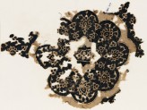 Textile fragment with eight-lobed rosette