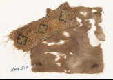 Textile fragment with quatrefoils set into diamond-shapes (EA1984.517)
