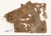 Textile fragment with quatrefoils set into diamond-shapes