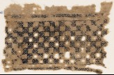 Textile fragment with linked squares