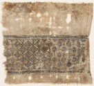 Textile fragment with grid of squares linked by diamond-shapes